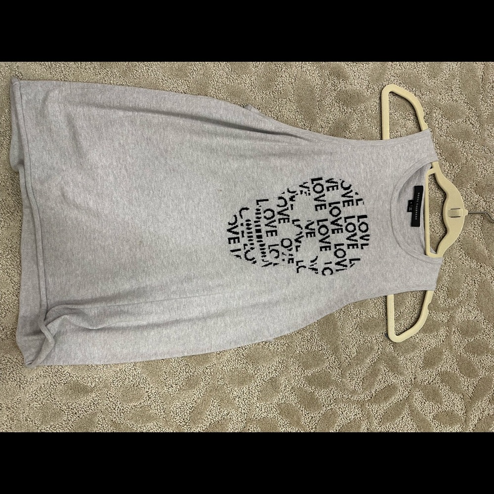 Skull cashmere sleeveless sweater. Size small. Love skull logo.